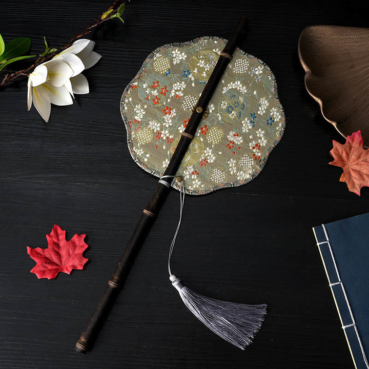 Buddha Stones Flores Hechas a Mano Melocotón Nispero Pájaro Grulla Mariposa Patrón Largo Púrpura Mango de Bambú Portátil Abanico Enrollable