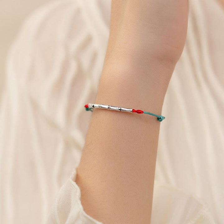 Pulsera de cuerda trenzada ultra-delgada de plata esterlina 925 con diseño de bambú de Buddha Stones