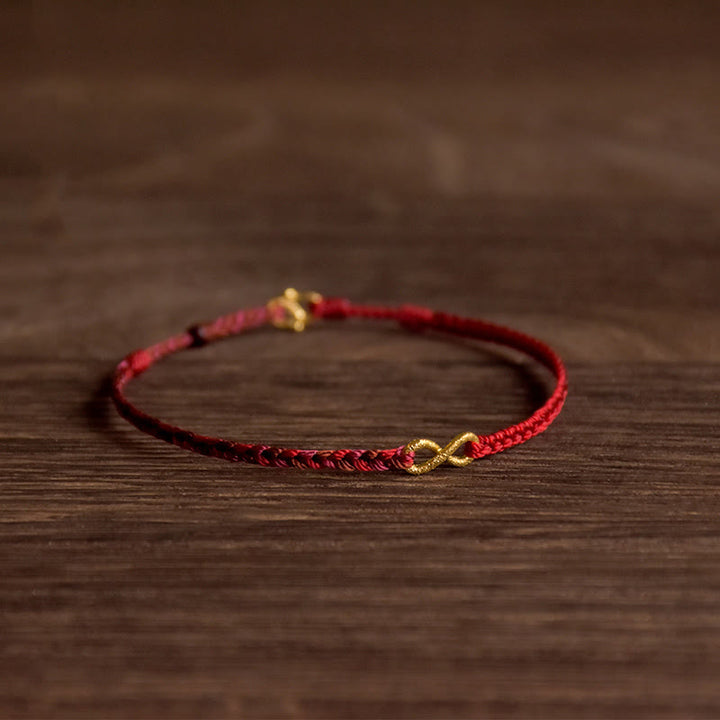 Pulsera de cuerda de la suerte hecha a mano con nudo infinito y Buddha Stones en oro 999