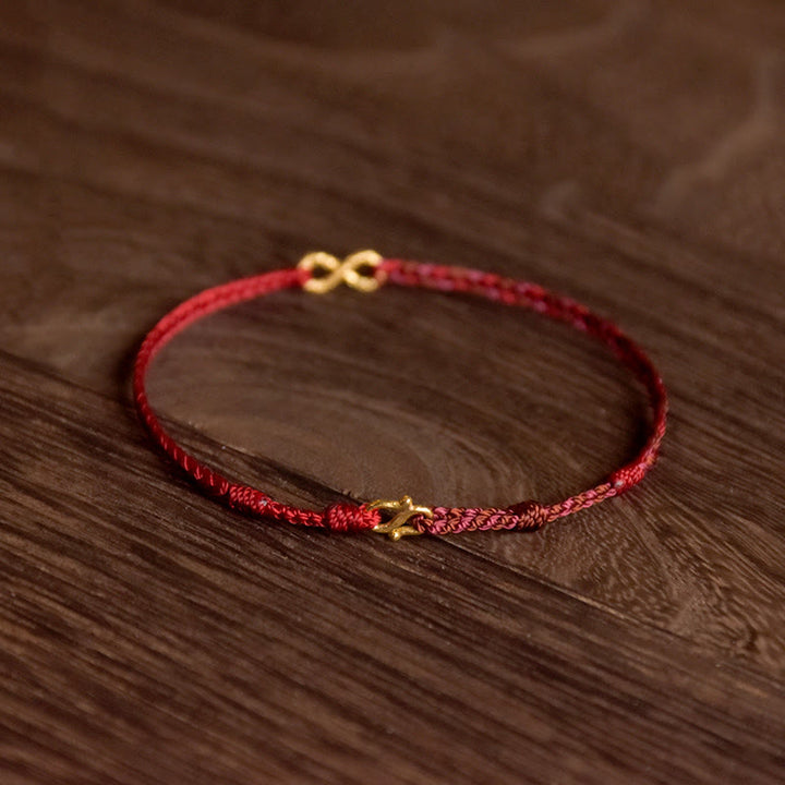 Pulsera de cuerda de la suerte hecha a mano con nudo infinito y Buddha Stones en oro 999