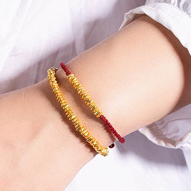 Pulsera trenzada de protección hecha a mano con diseño de pequeñas piezas de oro 999 y Buddha Stones