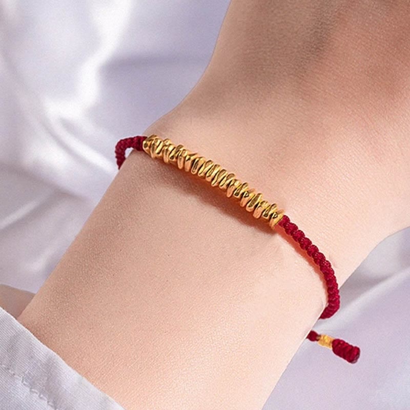 Pulsera trenzada de protección hecha a mano con diseño de pequeñas piezas de oro 999 y Buddha Stones