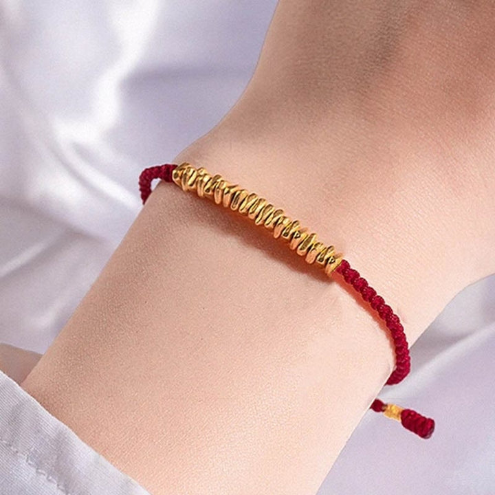 Pulsera trenzada de protección hecha a mano con diseño de pequeñas piezas de oro 999 y Buddha Stones