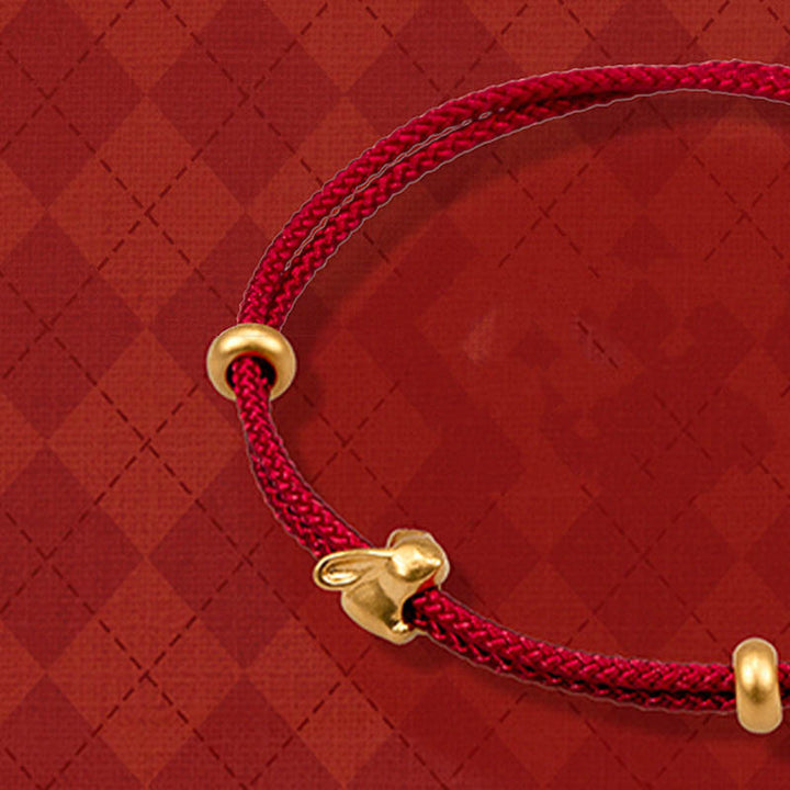 Pulsera trenzada de la suerte hecha a mano con diseño de osmanthus y conejo de la suerte en oro 999 con Buddha Stones