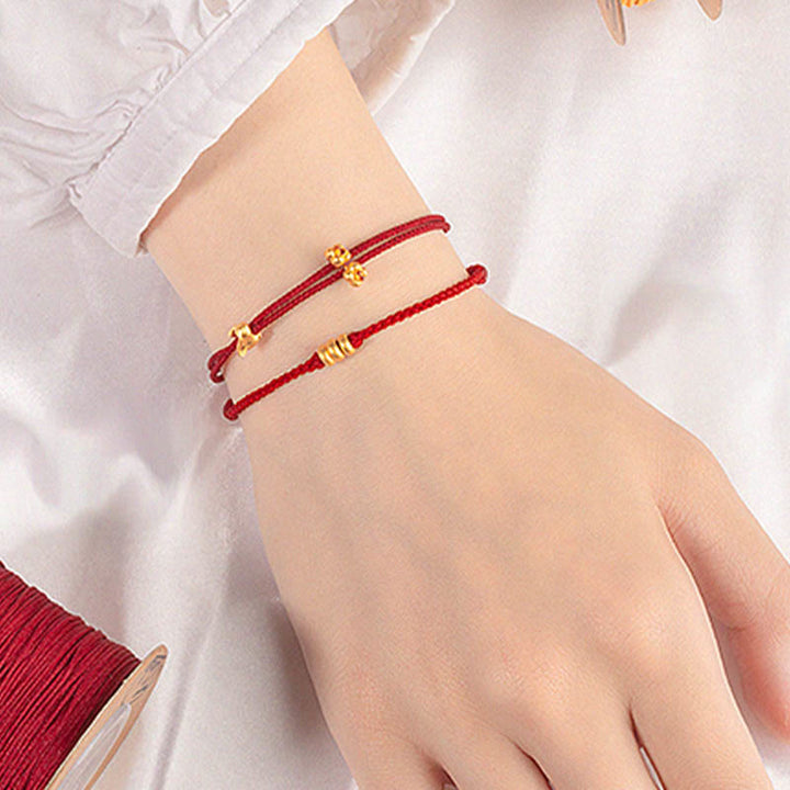 Pulsera trenzada de la suerte hecha a mano con diseño de osmanthus y conejo de la suerte en oro 999 con Buddha Stones