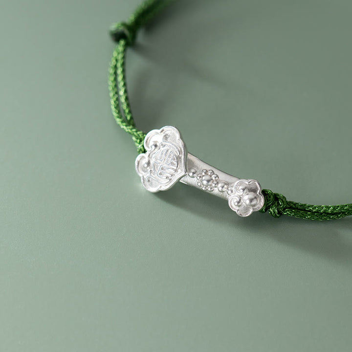 Pulsera trenzada de cuerda verde con mango de Ruyi y símbolo de la suerte hecha a mano con Buddha Stones en plata de ley 999