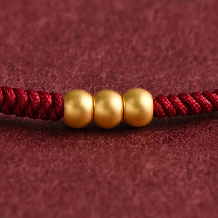 Pulsera de tobillo con cuerda de la suerte hecha a mano con diseño de tres cuentas en oro 999 y Buddha Stones
