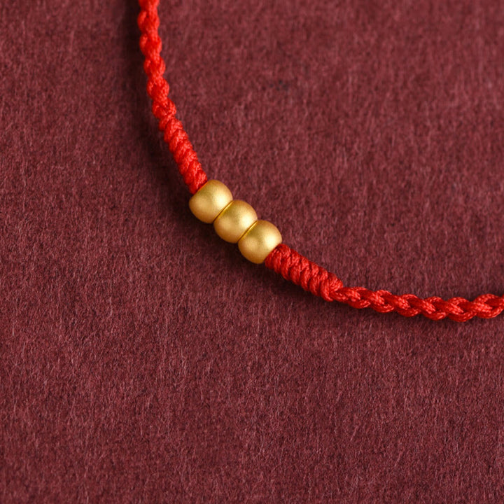 Pulsera de tobillo con cuerda de la suerte hecha a mano con diseño de tres cuentas en oro 999 y Buddha Stones