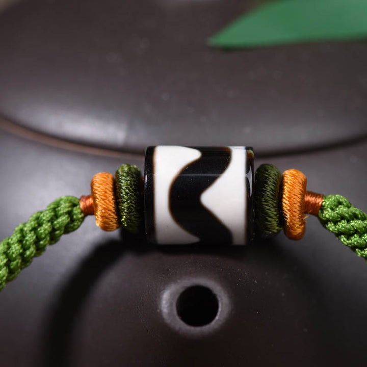 Pulsera trenzada de cuerda verde con protección de cuentas Dzi tibetanas hechas a mano con Buddha Stones