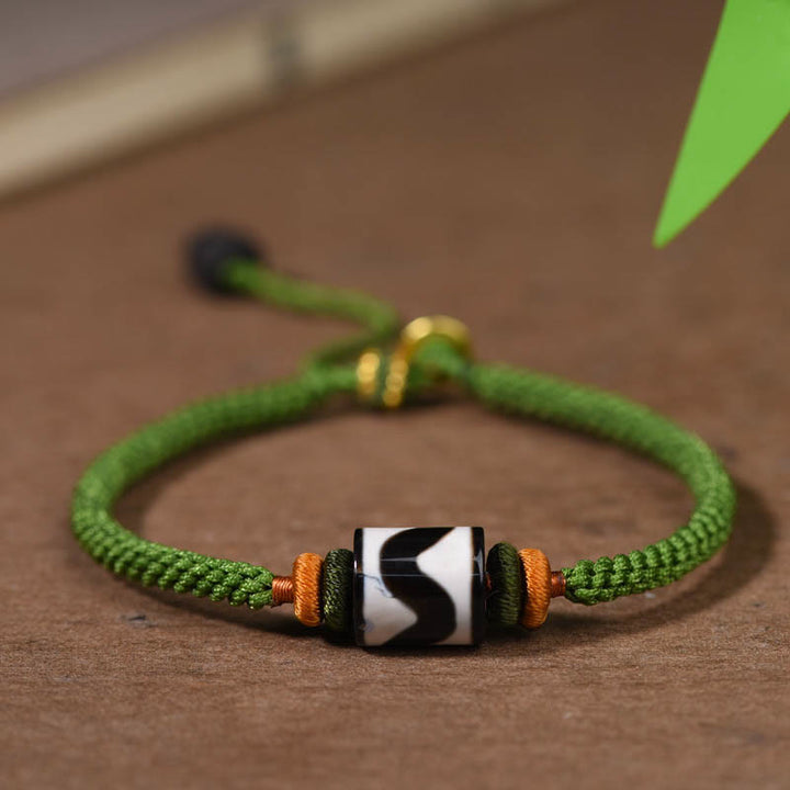 Pulsera trenzada de cuerda verde con protección de cuentas Dzi tibetanas hechas a mano con Buddha Stones