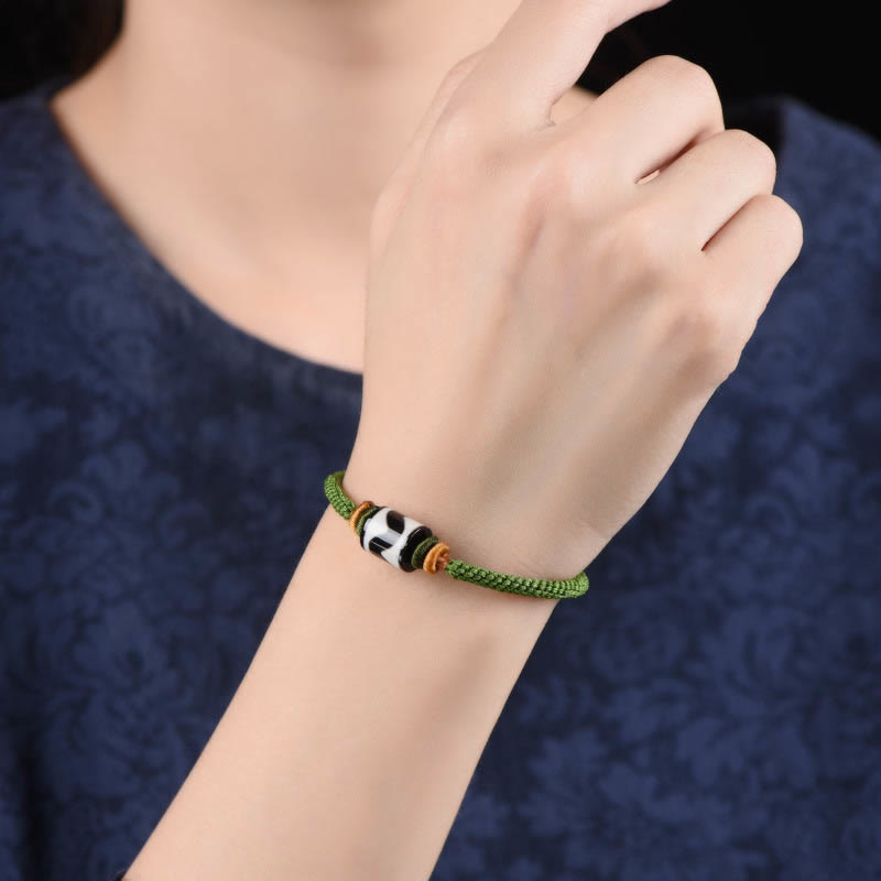 Pulsera trenzada de cuerda verde con protección de cuentas Dzi tibetanas hechas a mano con Buddha Stones