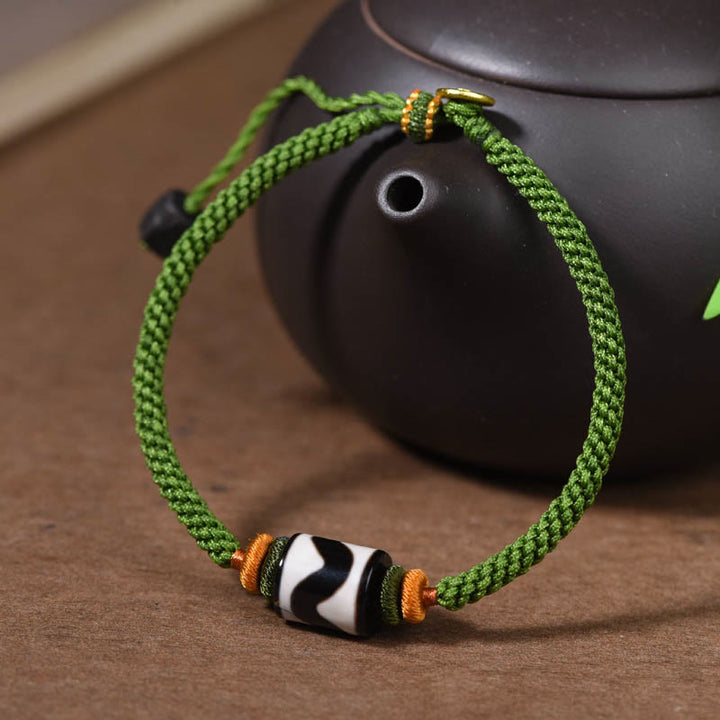 Pulsera trenzada de cuerda verde con protección de cuentas Dzi tibetanas hechas a mano con Buddha Stones