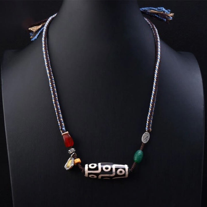 Collar con colgante de cuerda trenzada con protección de cuentas Dzi tibetanas de nueve ojos y Buddha Stones