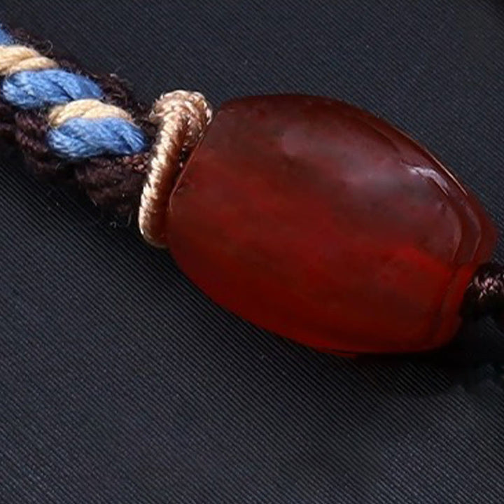 Collar con colgante de cuerda trenzada con protección de cuentas Dzi tibetanas de nueve ojos y Buddha Stones