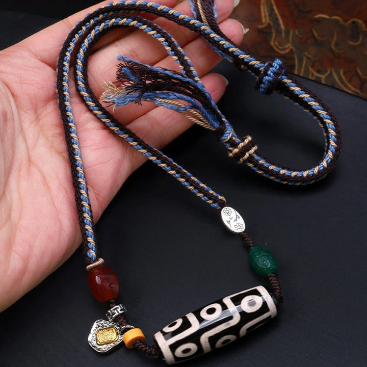 Collar con colgante de cuerda trenzada con protección de cuentas Dzi tibetanas de nueve ojos y Buddha Stones
