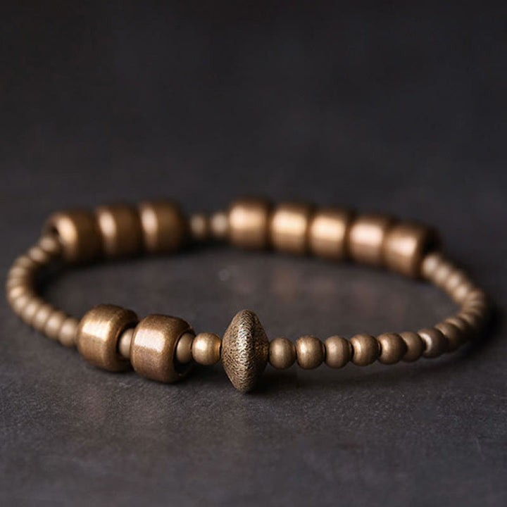 Pulsera de la riqueza de latón y cobre vintage con Buddha Stones