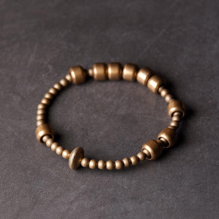 Pulsera de la riqueza de latón y cobre vintage con Buddha Stones