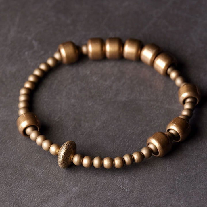 Pulsera de la riqueza de latón y cobre vintage con Buddha Stones