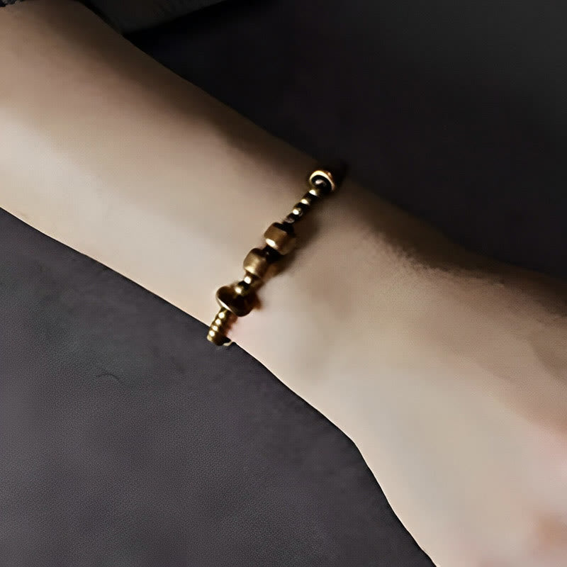 Pulsera de la riqueza de latón y cobre vintage con Buddha Stones