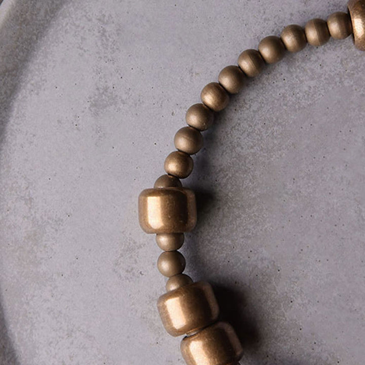 Pulsera de la riqueza de latón y cobre vintage con Buddha Stones