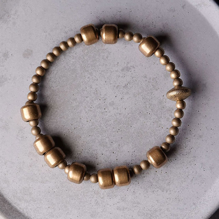 Pulsera de la riqueza de latón y cobre vintage con Buddha Stones