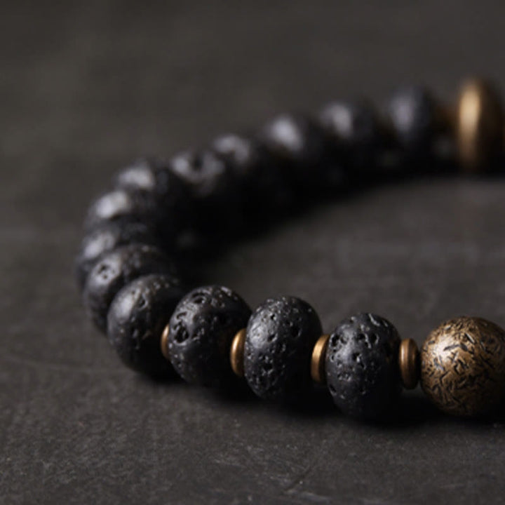 Pulsera de cobre con cuentas de lava y Buddha Stones que absorben energía negativa