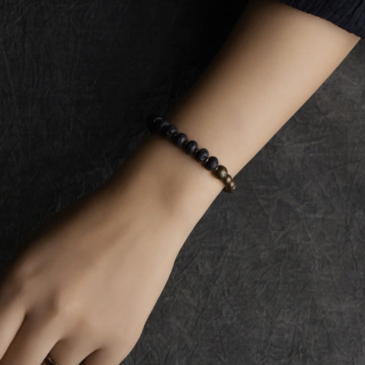 Pulsera de cobre con cuentas de lava y Buddha Stones que absorben energía negativa