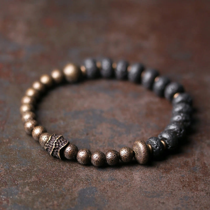 Pulsera de cobre con cuentas de lava y Buddha Stones que absorben energía negativa