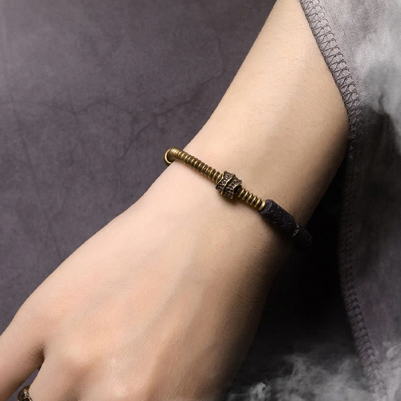 Pulsera de cobre con cuentas de lava negra y Buddha Stones para la suerte y la riqueza