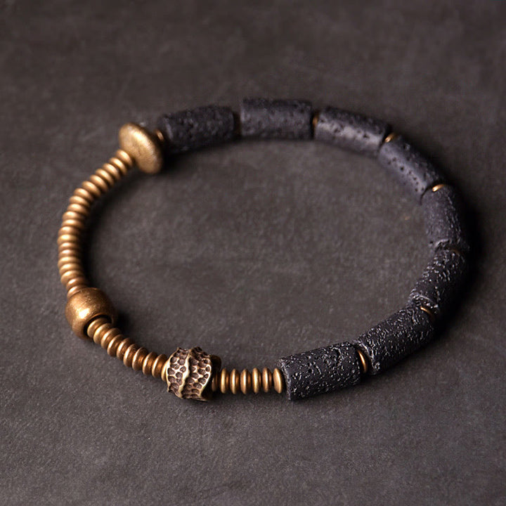 Pulsera de cobre con cuentas de lava negra y Buddha Stones para la suerte y la riqueza