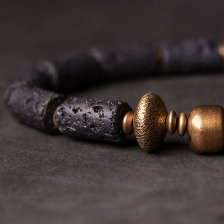 Pulsera de cobre con cuentas de lava negra y Buddha Stones para la suerte y la riqueza