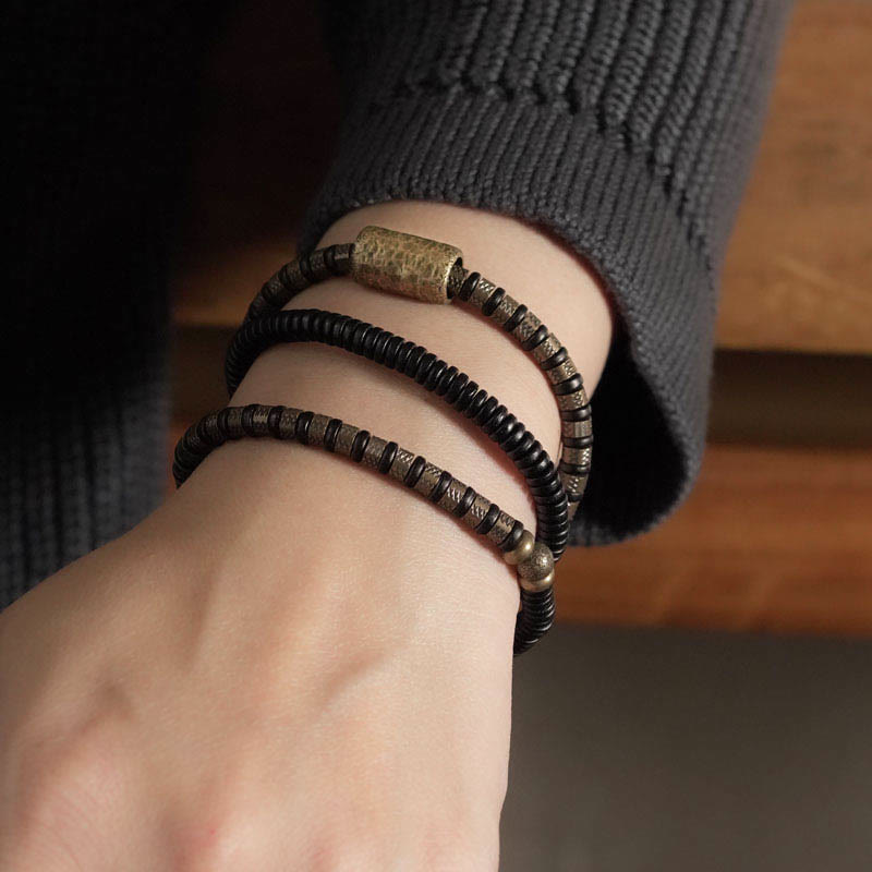 Pulsera de cobre multicapa con cuentas de madera de ébano tibetano y Buddha Stones