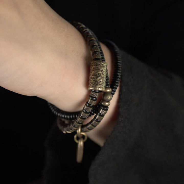 Pulsera de cobre multicapa con cuentas de madera de ébano tibetano y Buddha Stones
