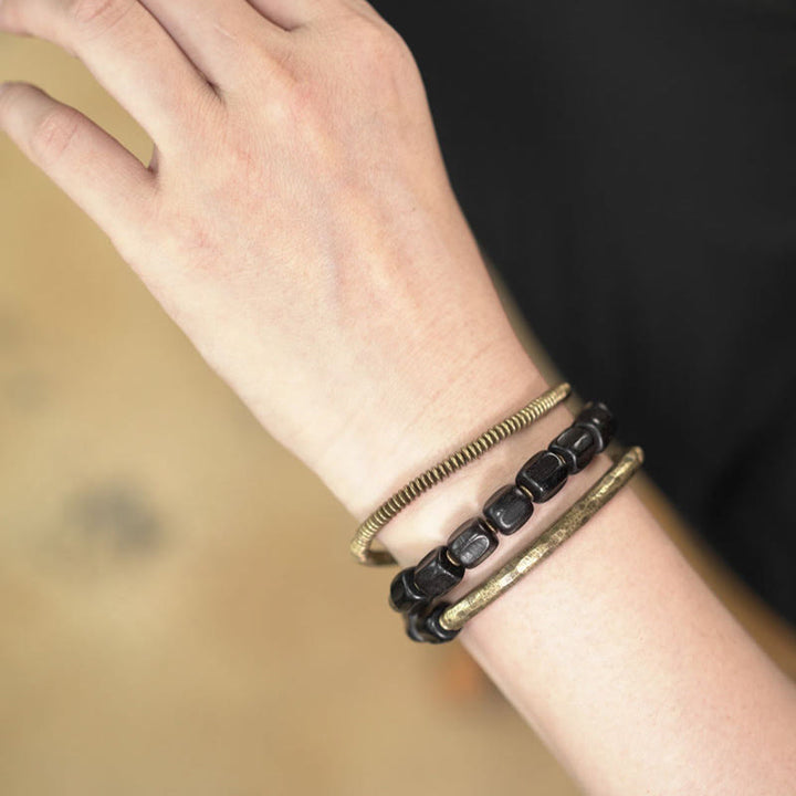 Pulsera curativa multicapa de cobre con cuentas de madera de ébano tibetano y Buddha Stones de la paz vintage