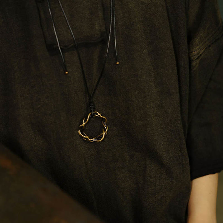 Collar con colgante de latón y cobre vintage hecho a mano con Buddha Stones