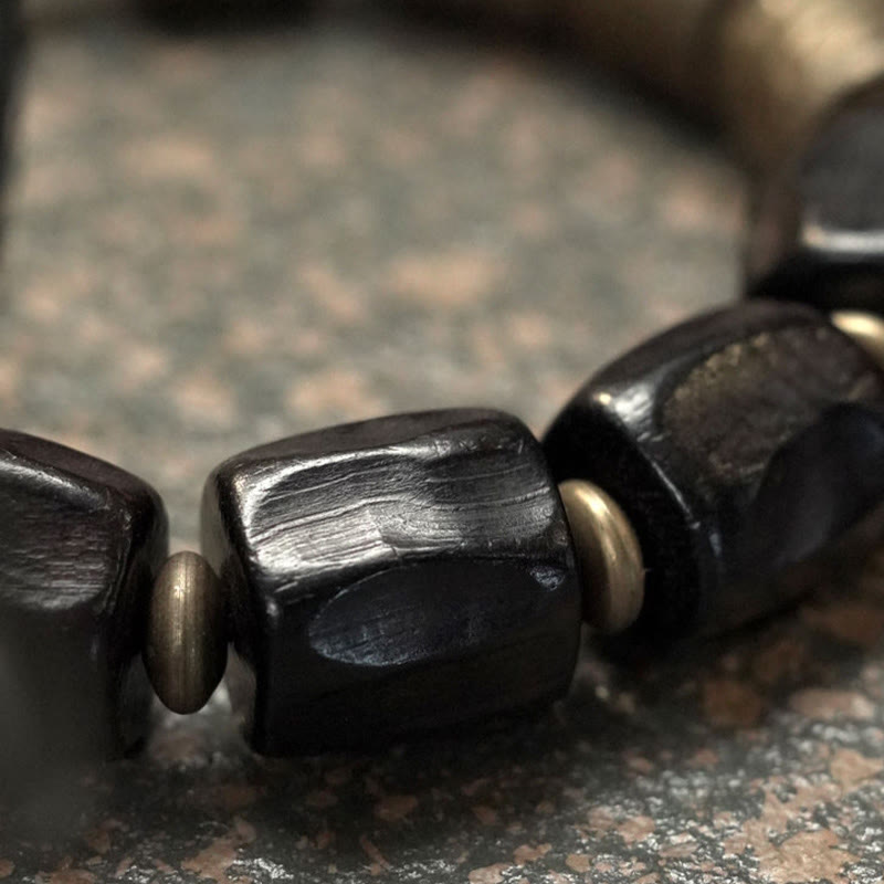 Pulsera de cuentas de cobre y madera de ébano con Buddha Stones y diseño vintage de la paz