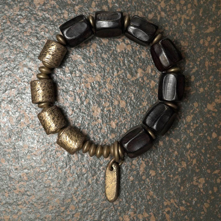 Pulsera de cuentas de cobre y madera de ébano con Buddha Stones y diseño vintage de la paz