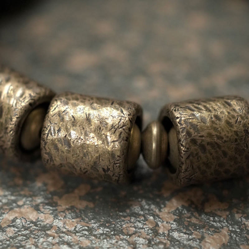 Pulsera de cuentas de cobre y madera de ébano con Buddha Stones y diseño vintage de la paz