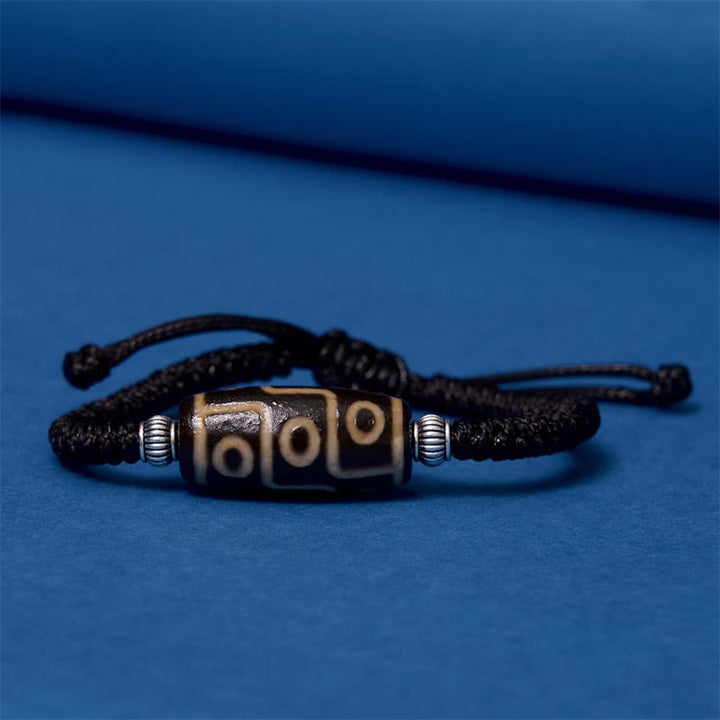 Buddha Stones Pulsera Tibetana con Cuentas Dzi de Nueve Ojos y de Tres Ojos para Protección y Riqueza