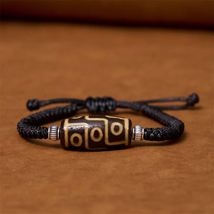 Buddha Stones Pulsera Tibetana con Cuentas Dzi de Nueve Ojos y de Tres Ojos para Protección y Riqueza