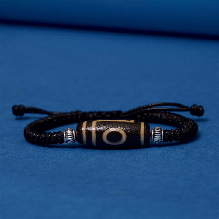 Buddha Stones Pulsera Tibetana con Cuentas Dzi de Nueve Ojos y de Tres Ojos para Protección y Riqueza