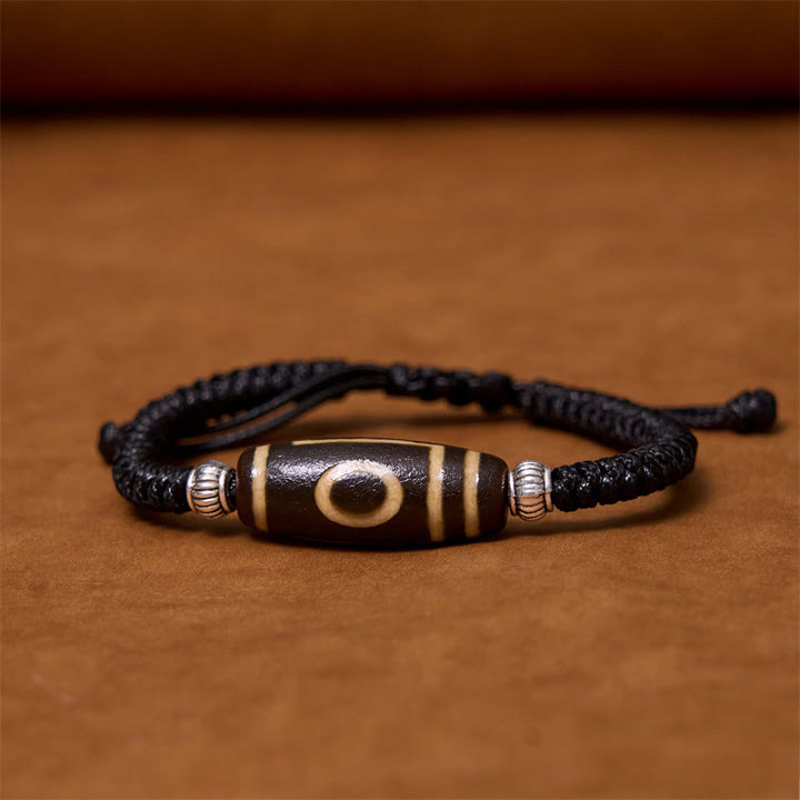 Buddha Stones Pulsera Tibetana con Cuentas Dzi de Nueve Ojos y de Tres Ojos para Protección y Riqueza