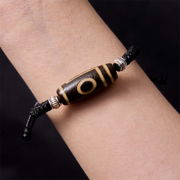 Buddha Stones Pulsera Tibetana con Cuentas Dzi de Nueve Ojos y de Tres Ojos para Protección y Riqueza