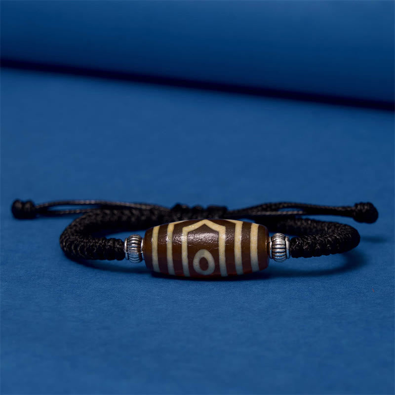 Buddha Stones Pulsera Tibetana con Cuentas Dzi de Nueve Ojos y de Tres Ojos para Protección y Riqueza