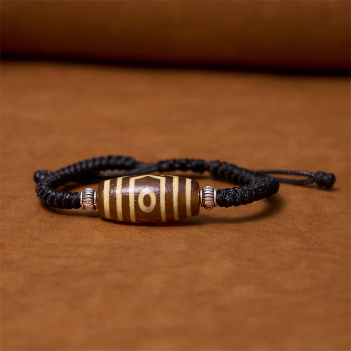 Buddha Stones Pulsera Tibetana con Cuentas Dzi de Nueve Ojos y de Tres Ojos para Protección y Riqueza