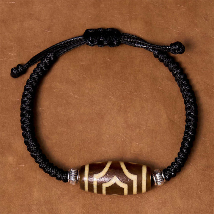 Buddha Stones Pulsera Tibetana con Cuentas Dzi de Nueve Ojos y de Tres Ojos para Protección y Riqueza