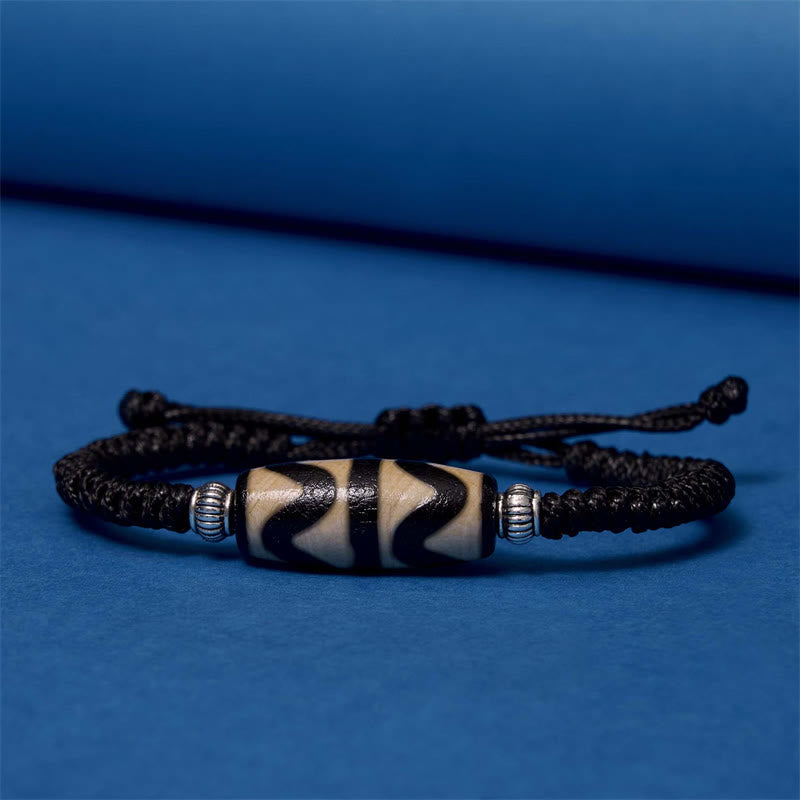 Buddha Stones Pulsera Tibetana con Cuentas Dzi de Nueve Ojos y de Tres Ojos para Protección y Riqueza