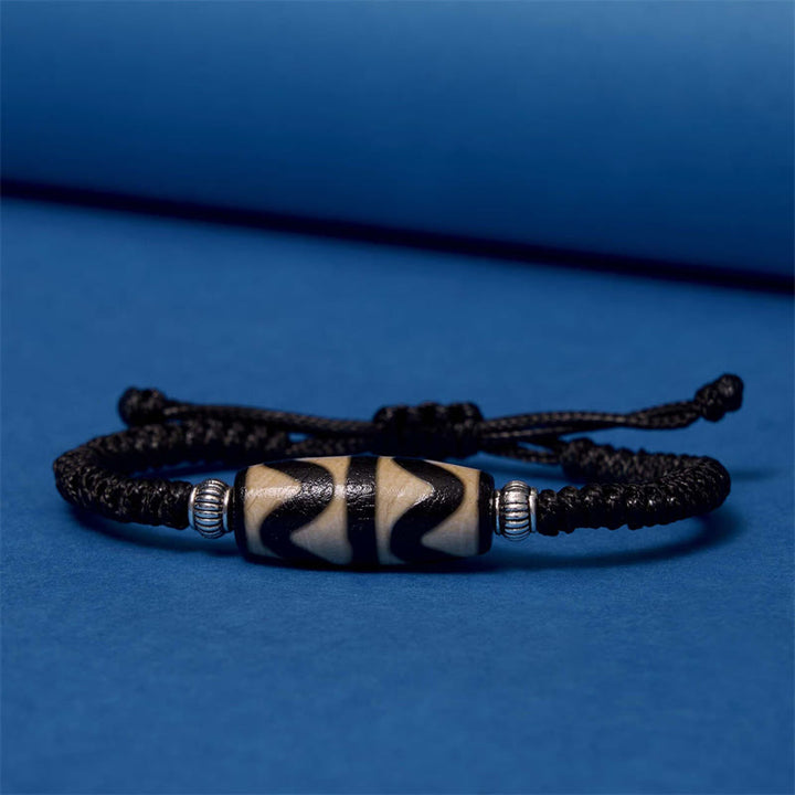 Buddha Stones Pulsera Tibetana con Cuentas Dzi de Nueve Ojos y de Tres Ojos para Protección y Riqueza