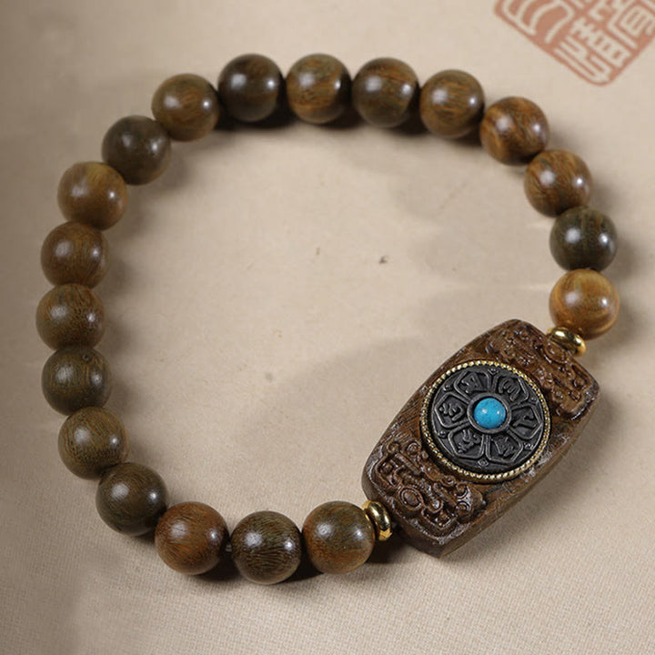 Pulsera de seis palabras verdaderas de la paz con hojas pequeñas de sándalo rojo y sándalo verde y piedras de Buddha Stones