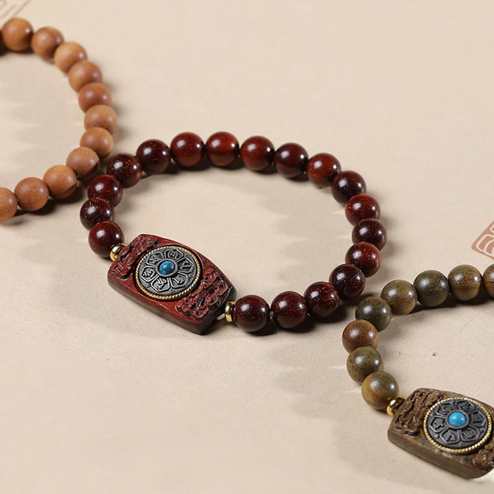 Pulsera de seis palabras verdaderas de la paz con hojas pequeñas de sándalo rojo y sándalo verde y piedras de Buddha Stones